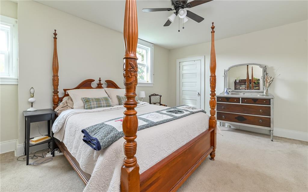 516 Pittsburgh Street Mars, PA 16046 - Photo 14 of 21 a bedroom with a bed and window