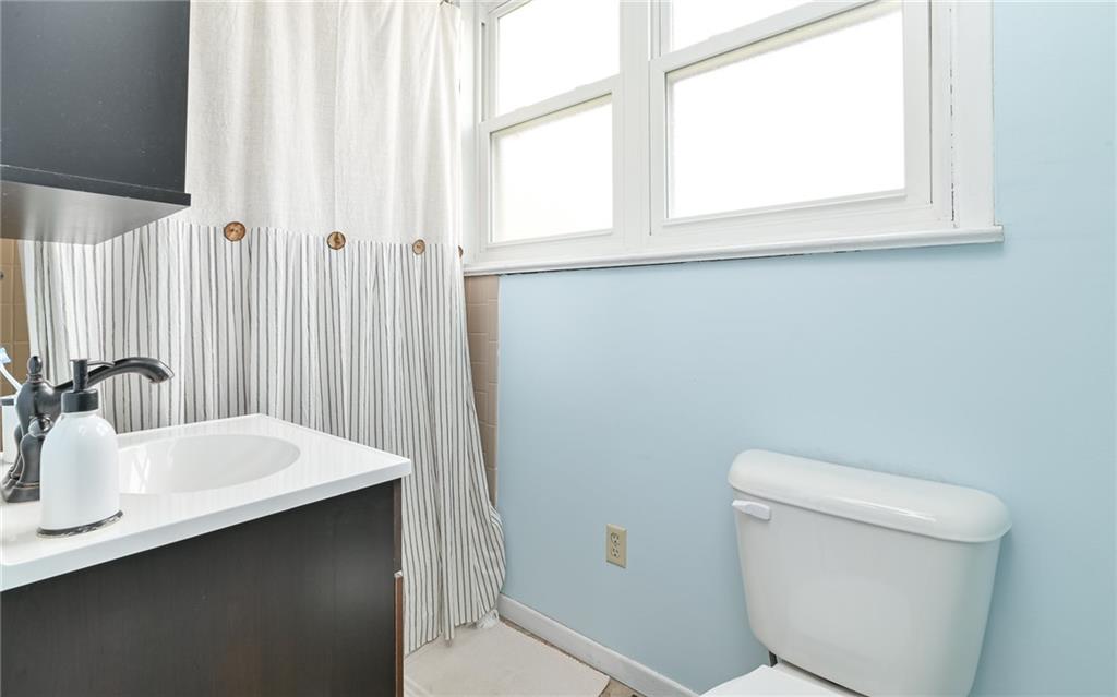 516 Pittsburgh Street Mars, PA 16046 - Photo 15 of 21 a bathroom with a sink a toilet and a mirror