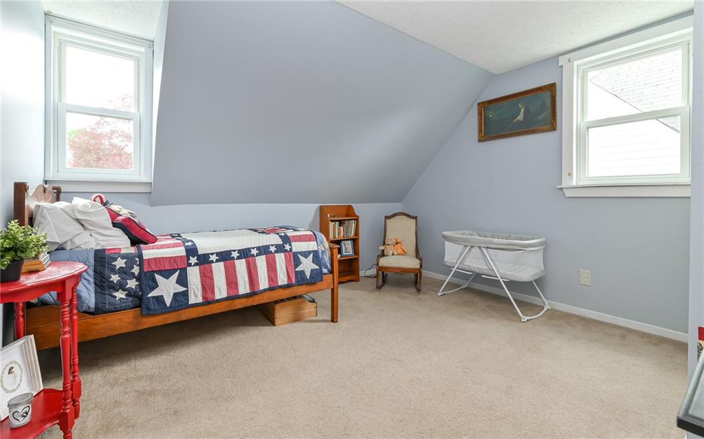 516 Pittsburgh Street Mars, PA 16046 - Photo 16 of 21 a bedroom with a bed and window