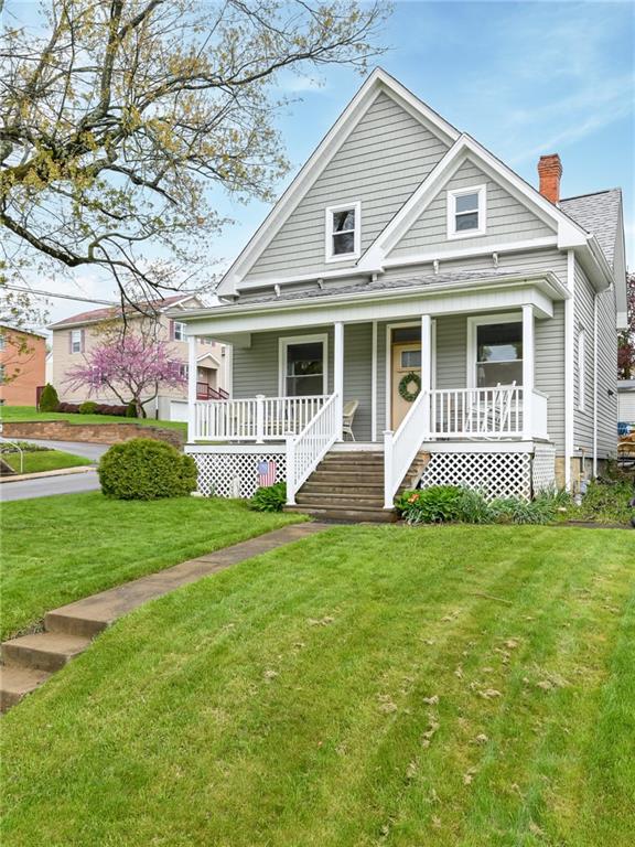 516 Pittsburgh Street Mars, PA 16046 - Photo 2 of 21 a front view of a house with a garden