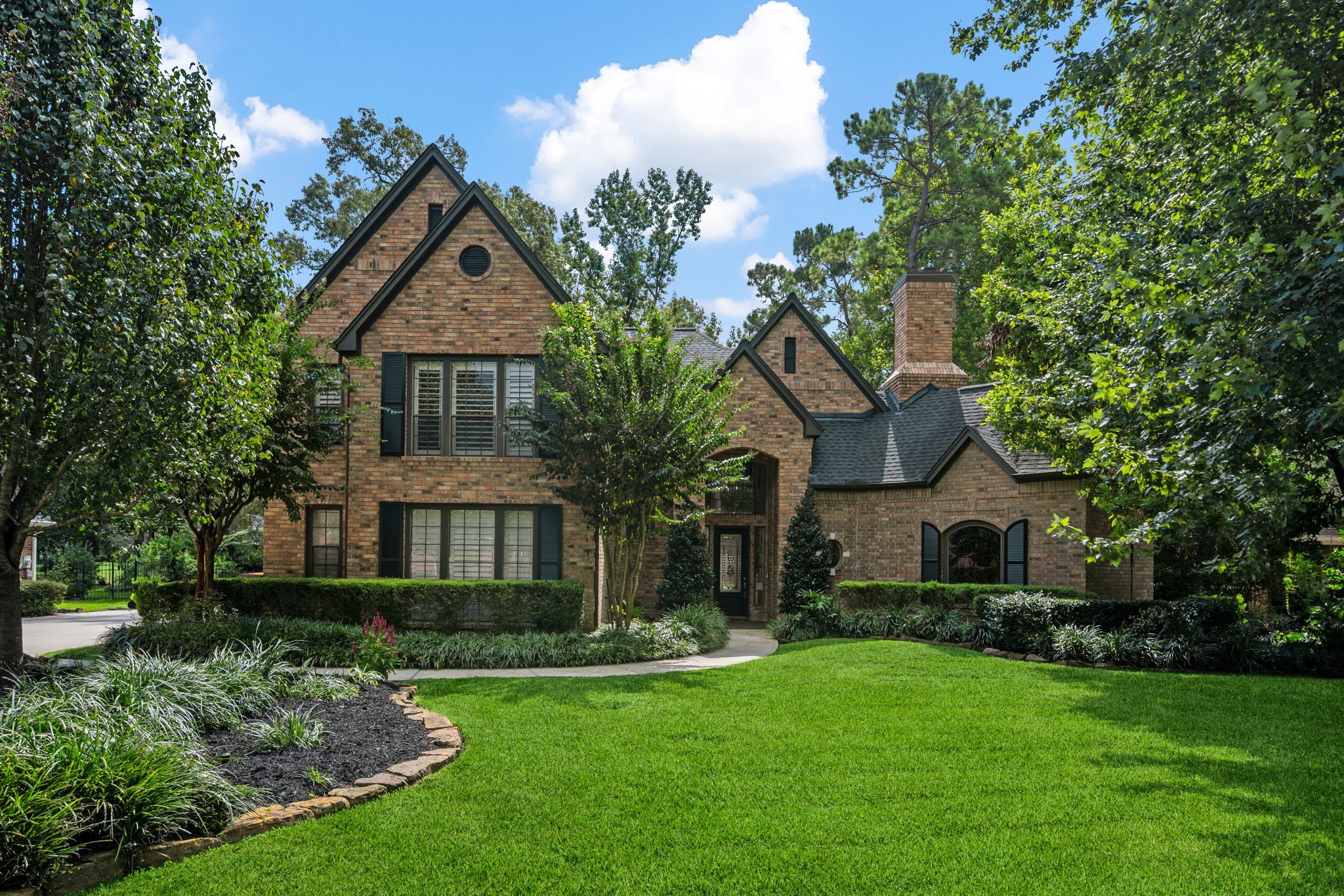 43 Firefall Court Spring, TX 77380 - Photo 2 of 48 Welcome to 43 Firefall Court, where premier golf course living meets cul-de-sac privacy on the 8th fairway of The Oaks Course.
