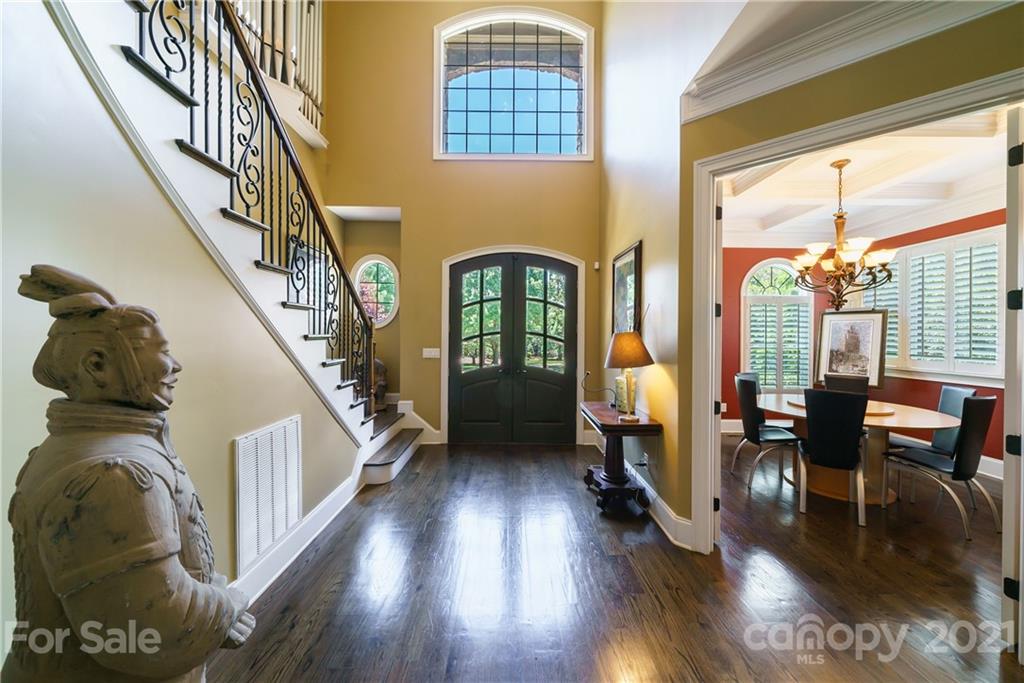 17405 Sail View Drive Cornelius, NC 28031 - Photo 2 of 43 a view of hall way with furniture and staircase with wooden floor