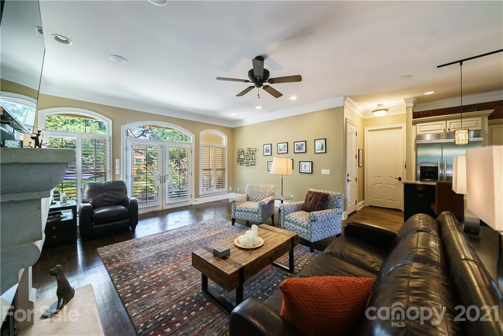17405 Sail View Drive Cornelius, NC 28031 - Photo 14 of 43 a living room with furniture ceiling fan and a window