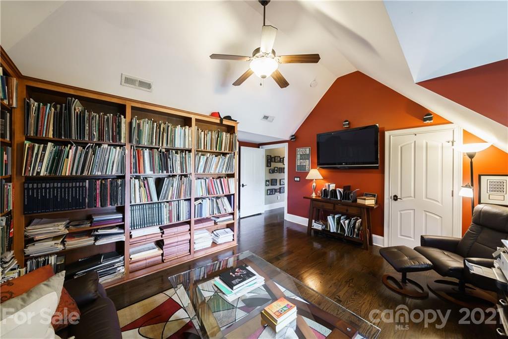17405 Sail View Drive Cornelius, NC 28031 - Photo 24 of 43 a living room with lots of furniture and a flat screen tv