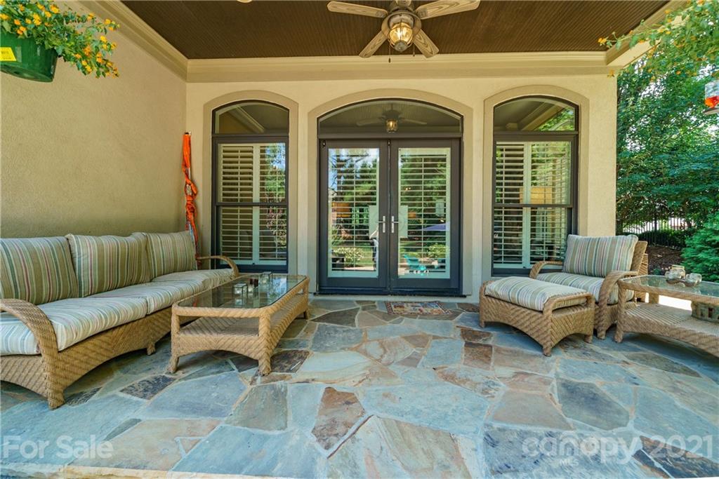 17405 Sail View Drive Cornelius, NC 28031 - Photo 25 of 43 a view of a livingroom with couch and a potted plant