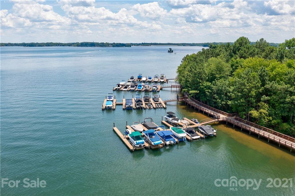 17405 Sail View Drive Cornelius, NC 28031 - Photo 43 of 43 a small pool with some trees in the background