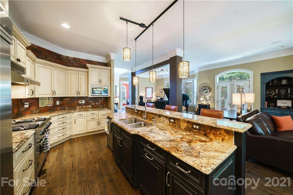 17405 Sail View Drive Cornelius, NC 28031 - Photo 9 of 43 a large kitchen with granite countertop lots of counter top space
