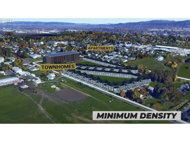 a view of city with ocean