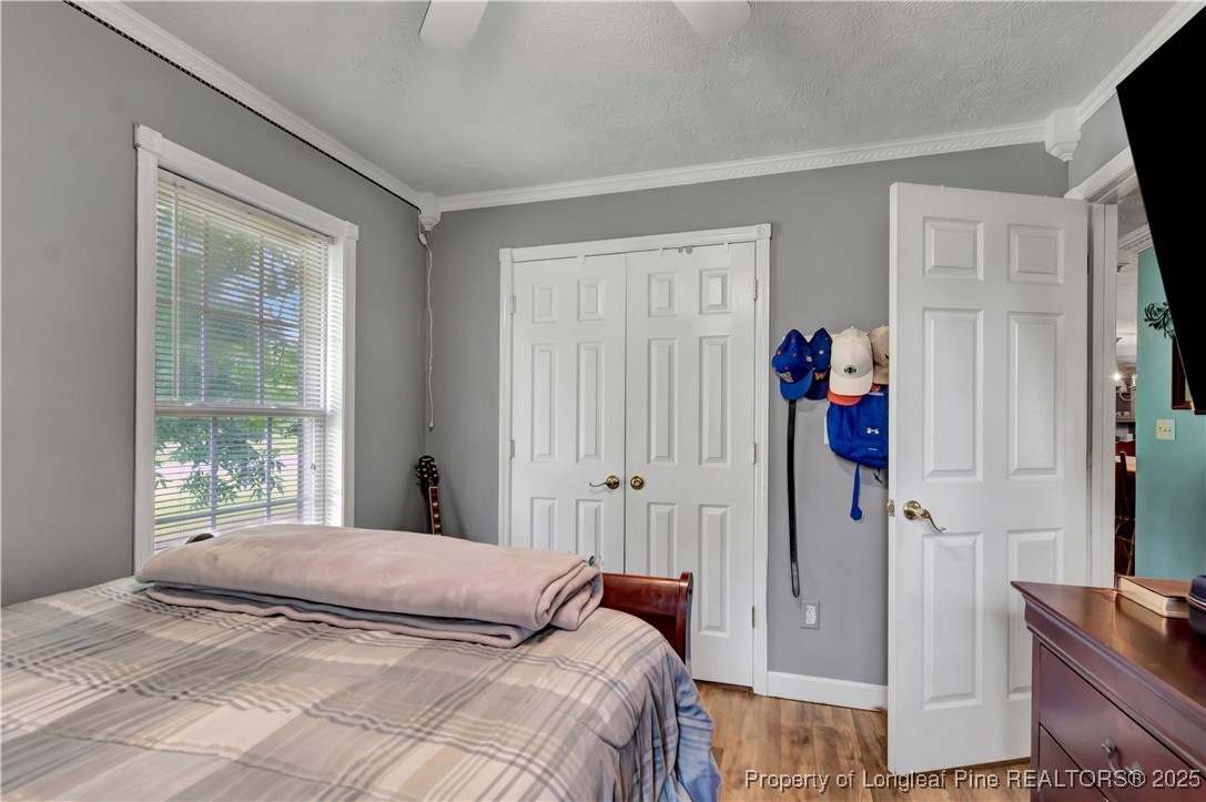 1079 Charlie Williamson Road Whiteville, NC 28472 - Photo 25 of 35 a bedroom with a bed and a window