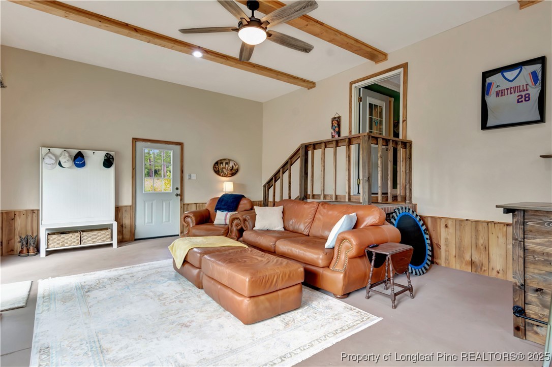 1079 Charlie Williamson Road Whiteville, NC 28472 - Photo 29 of 35 a living room with furniture and a rug