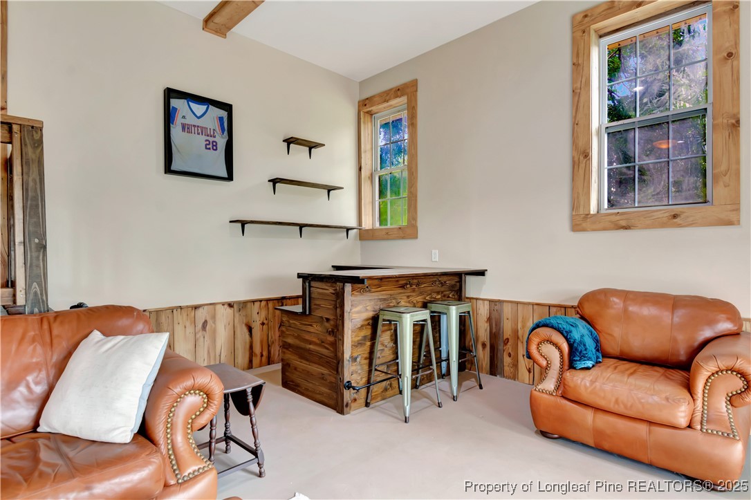 1079 Charlie Williamson Road Whiteville, NC 28472 - Photo 31 of 35 a living room with furniture and a couch
