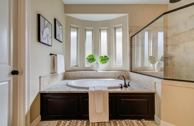 a bathroom with a sink and a bathtub