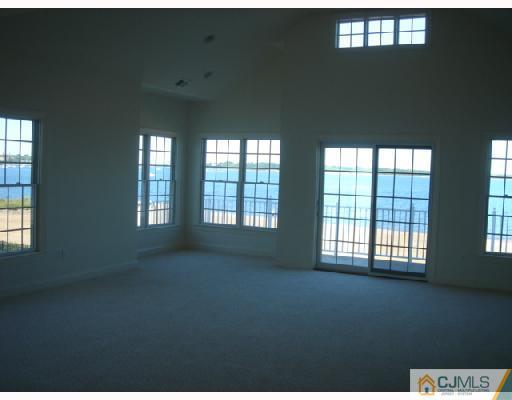 74 Raritan Reach Road South Amboy, NJ 08879 - Photo 3 of 8 a view of an empty room with a window