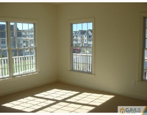 74 Raritan Reach Road South Amboy, NJ 08879 - Photo 5 of 8 a view of an empty room and window
