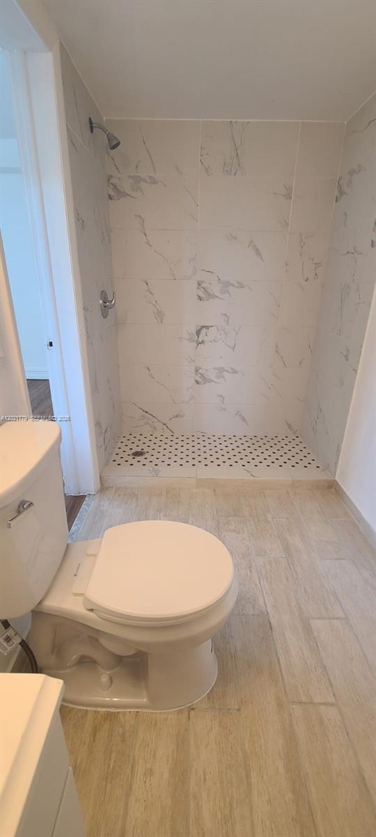 11800 Southwest 18th Street, Unit 4094 Miami, FL 33175 - Photo 10 of 14 a bathroom with a toilet and a bathtub