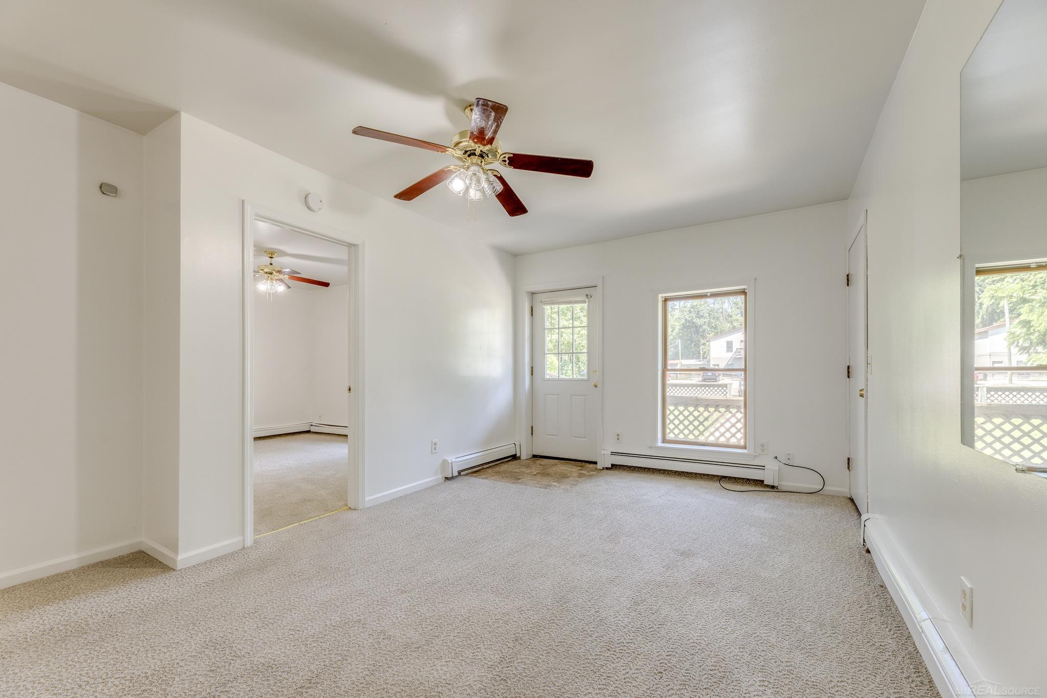7766 Shorecliff Road Lexington, MI 48450 - Photo 3 of 29 Entry into Main Floor Uni