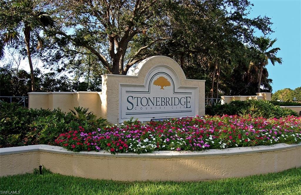 1820 Pondside Lane Naples, FL 34109 - Photo 12 of 17 a view of sign board with flower in background