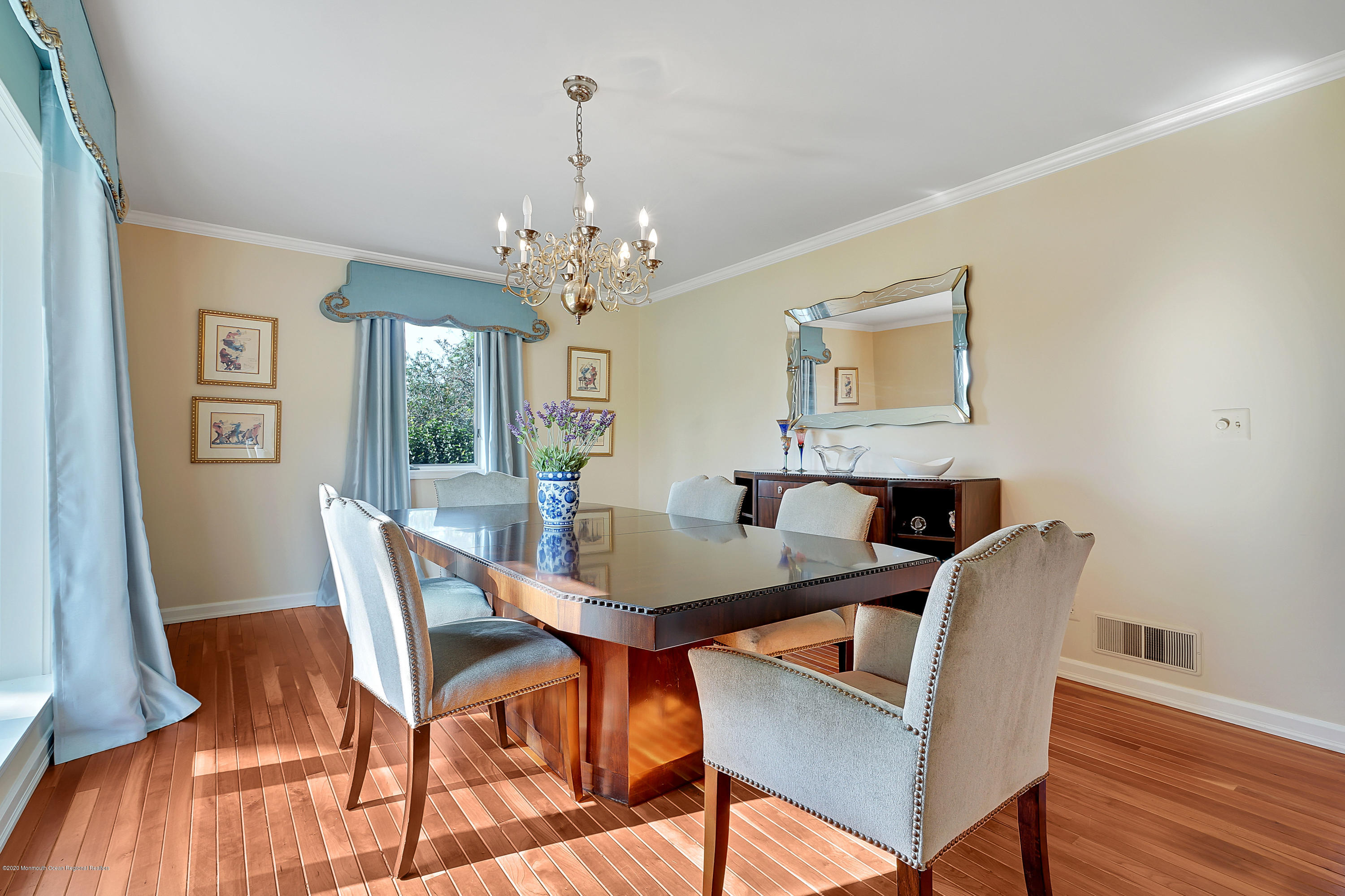 56 Hominy Hill Road Colts Neck, NJ 07722 - Photo 18 of 106 a view of a dining room with furniture and wooden floor
