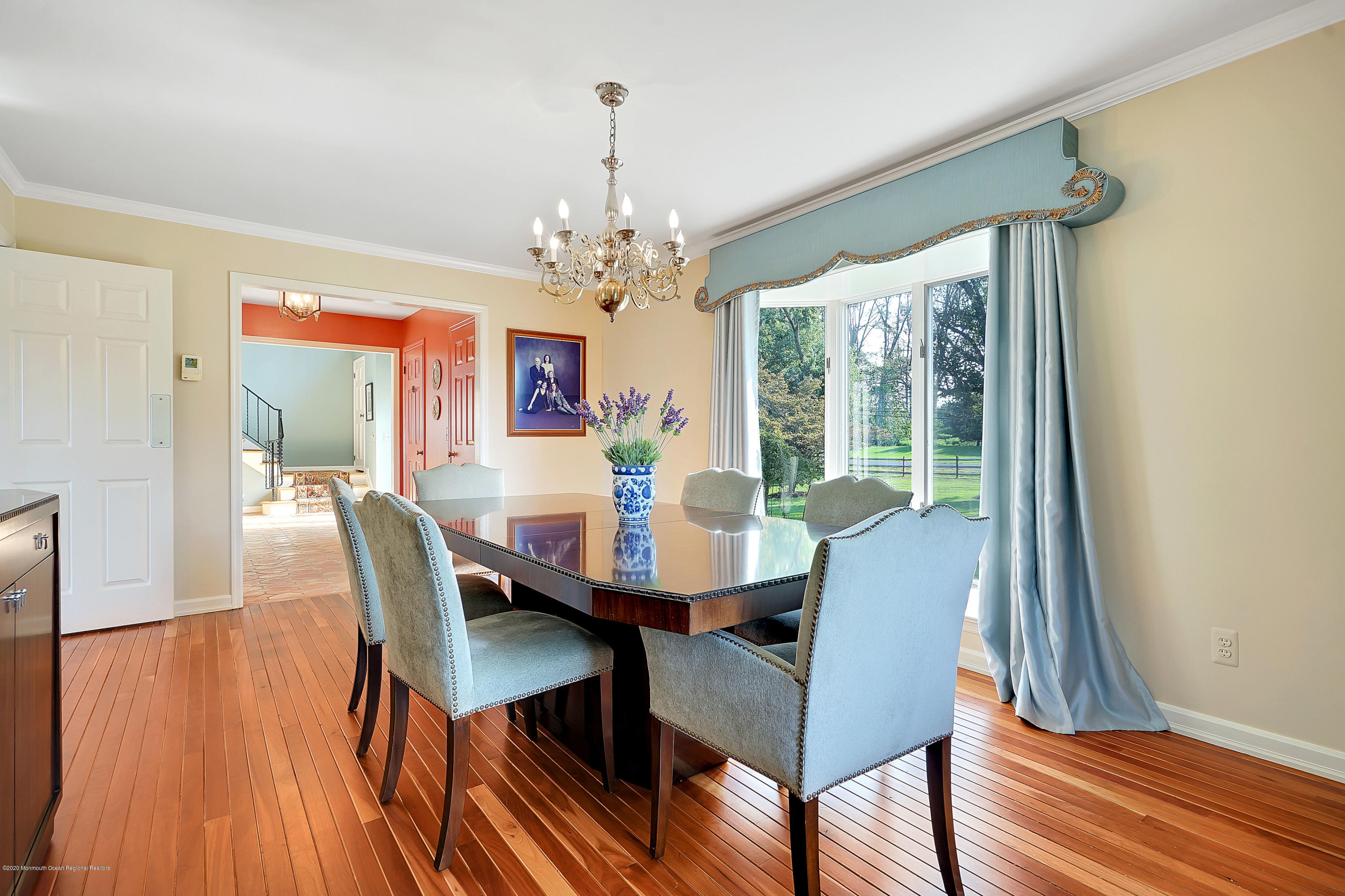 56 Hominy Hill Road Colts Neck, NJ 07722 - Photo 20 of 106 a view of a dining room with furniture window and wooden floor