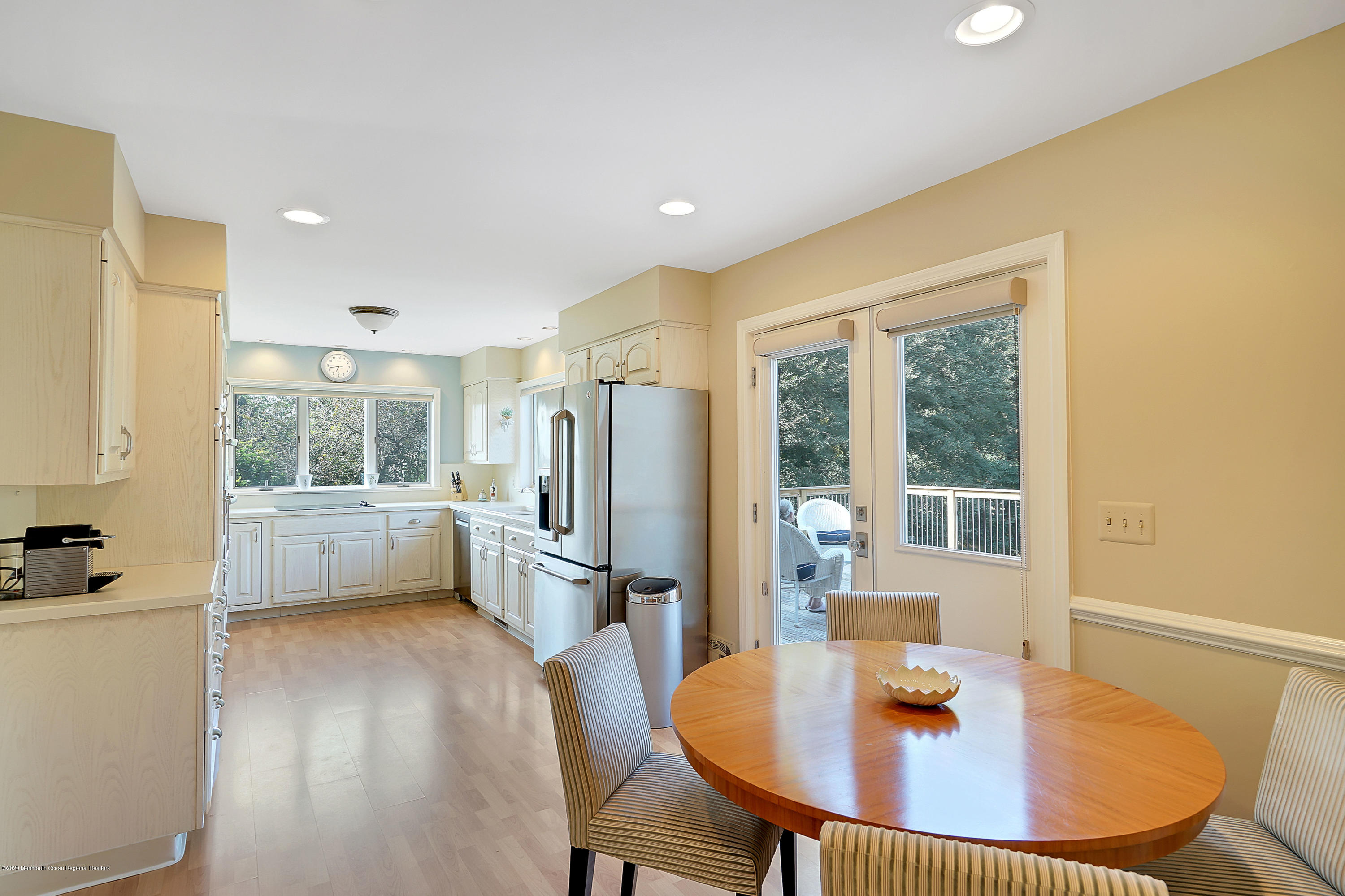 56 Hominy Hill Road Colts Neck, NJ 07722 - Photo 21 of 106 a dining room with furniture and a window
