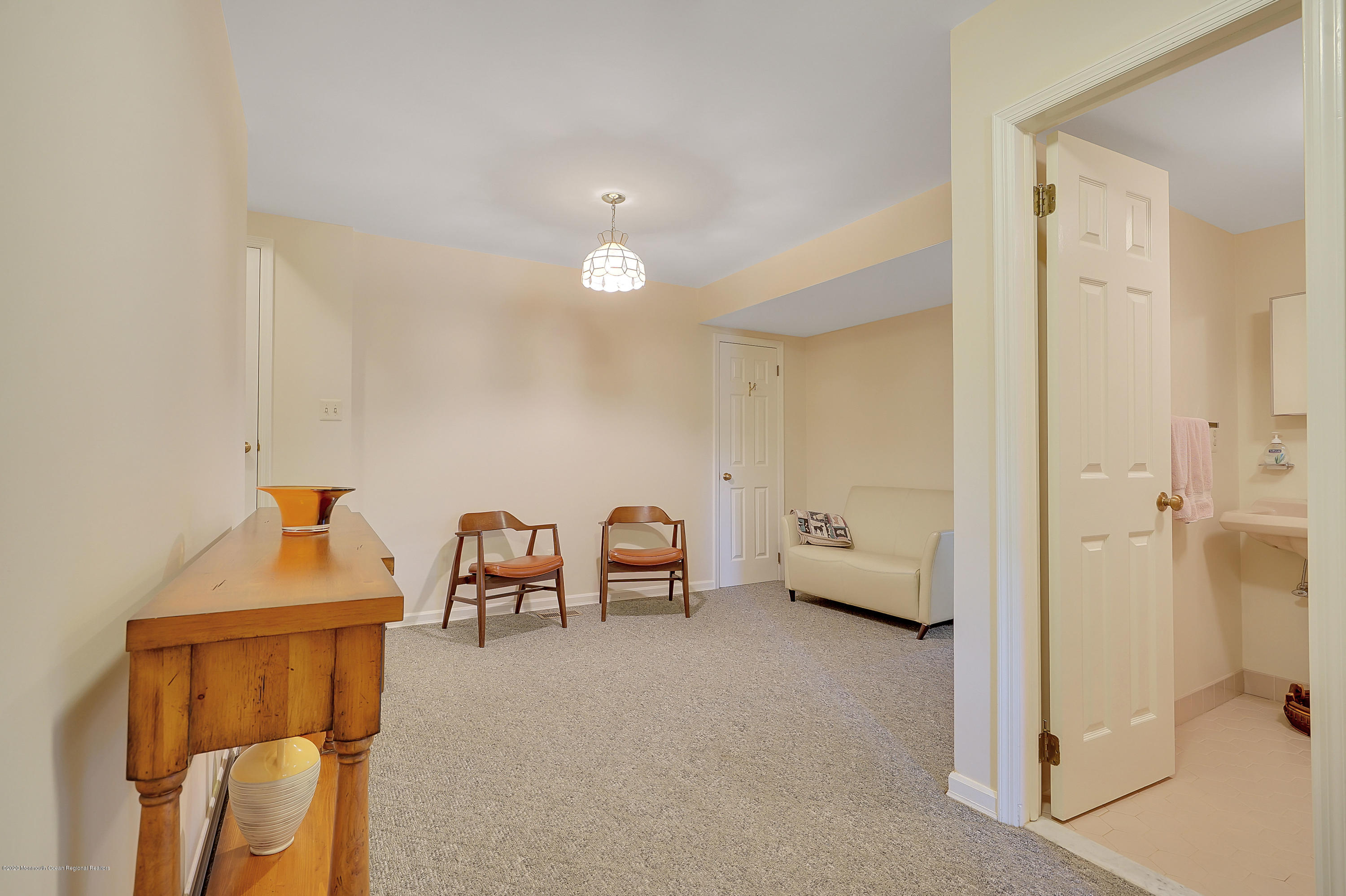 56 Hominy Hill Road Colts Neck, NJ 07722 - Photo 53 of 106 a view of a livingroom with furniture and windows