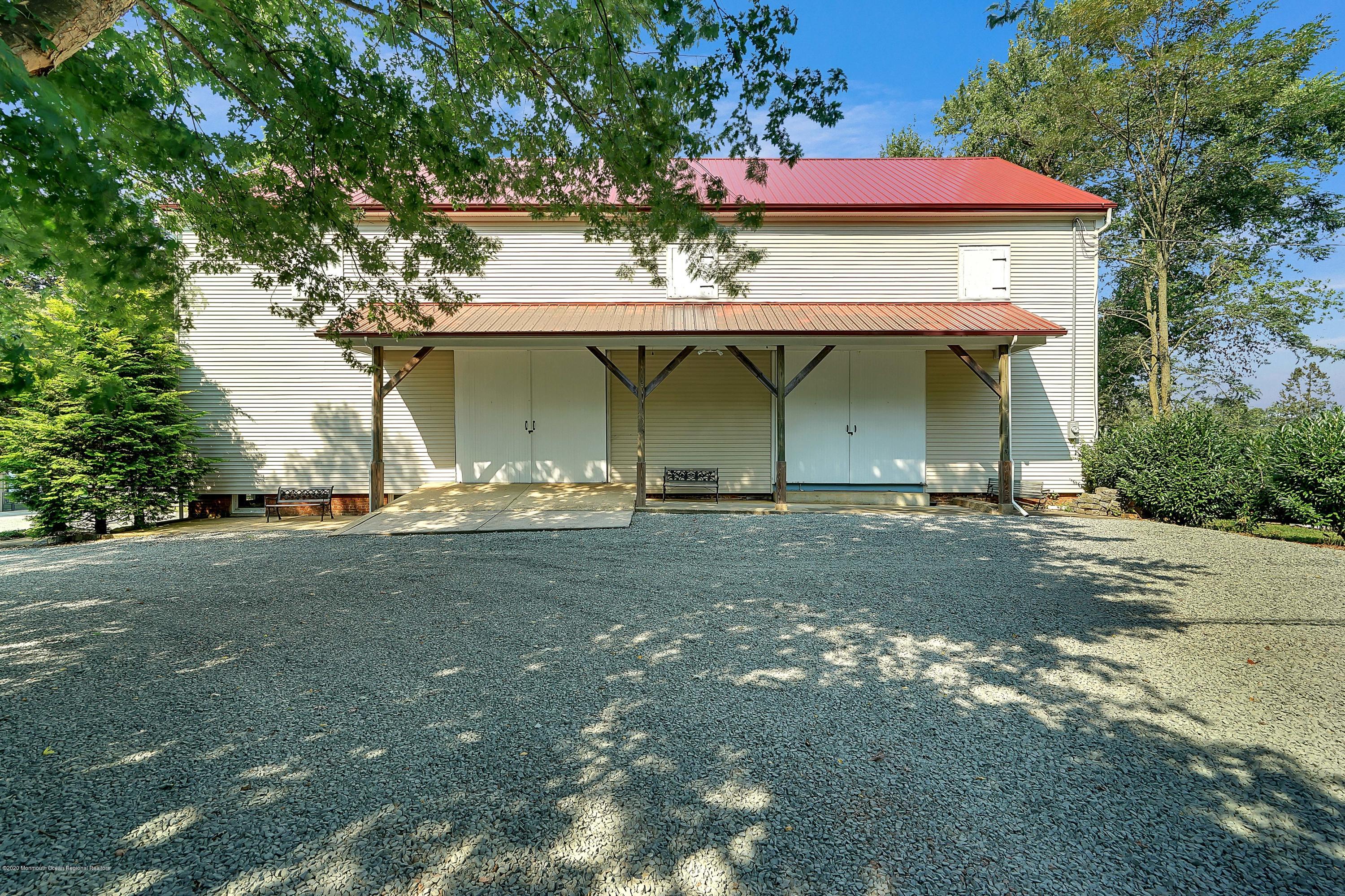 56 Hominy Hill Road Colts Neck, NJ 07722 - Photo 6 of 106 a view of a house with a yard
