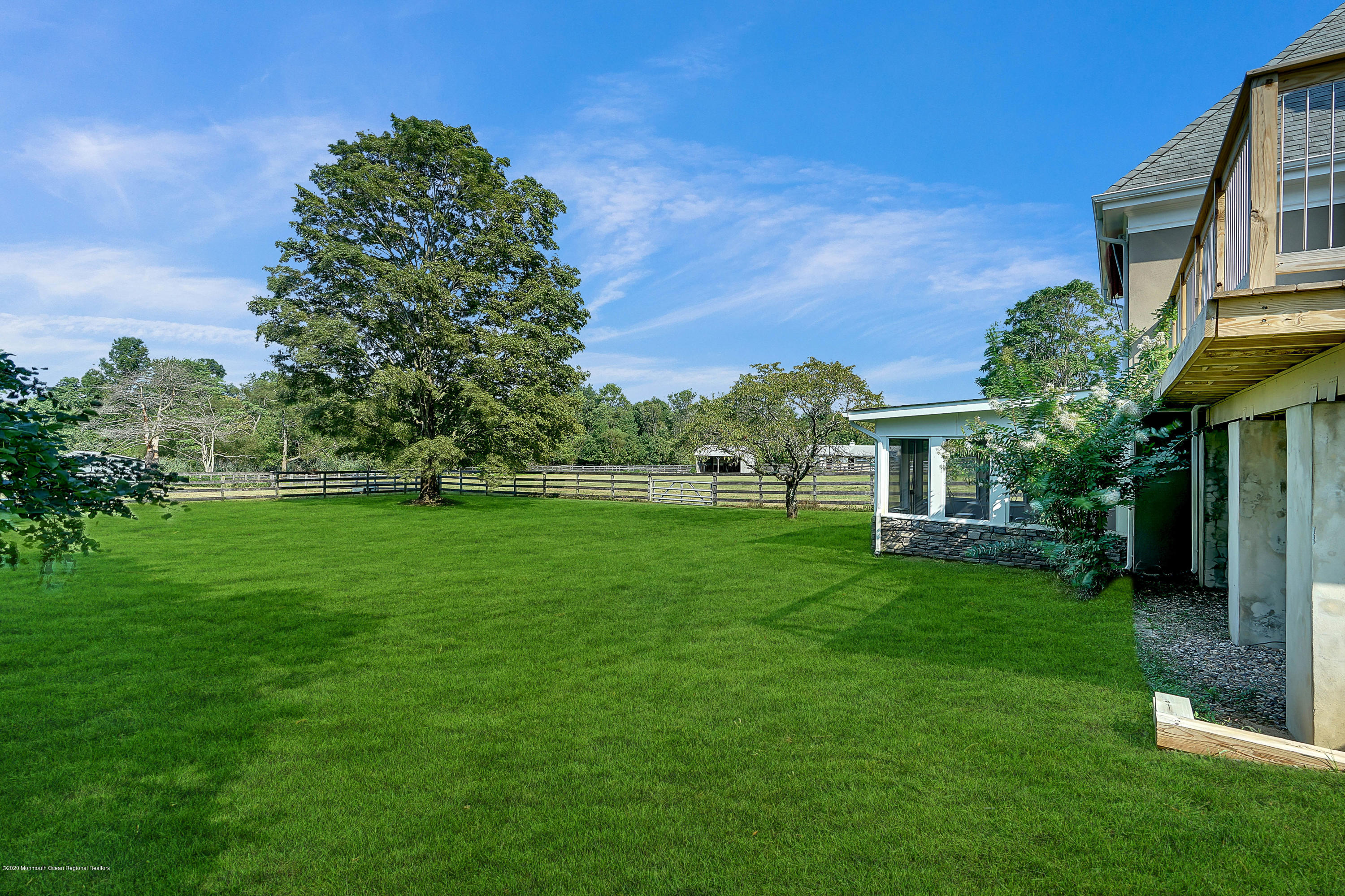 56 Hominy Hill Road Colts Neck, NJ 07722 - Photo 68 of 106 a front view of a house with a yard