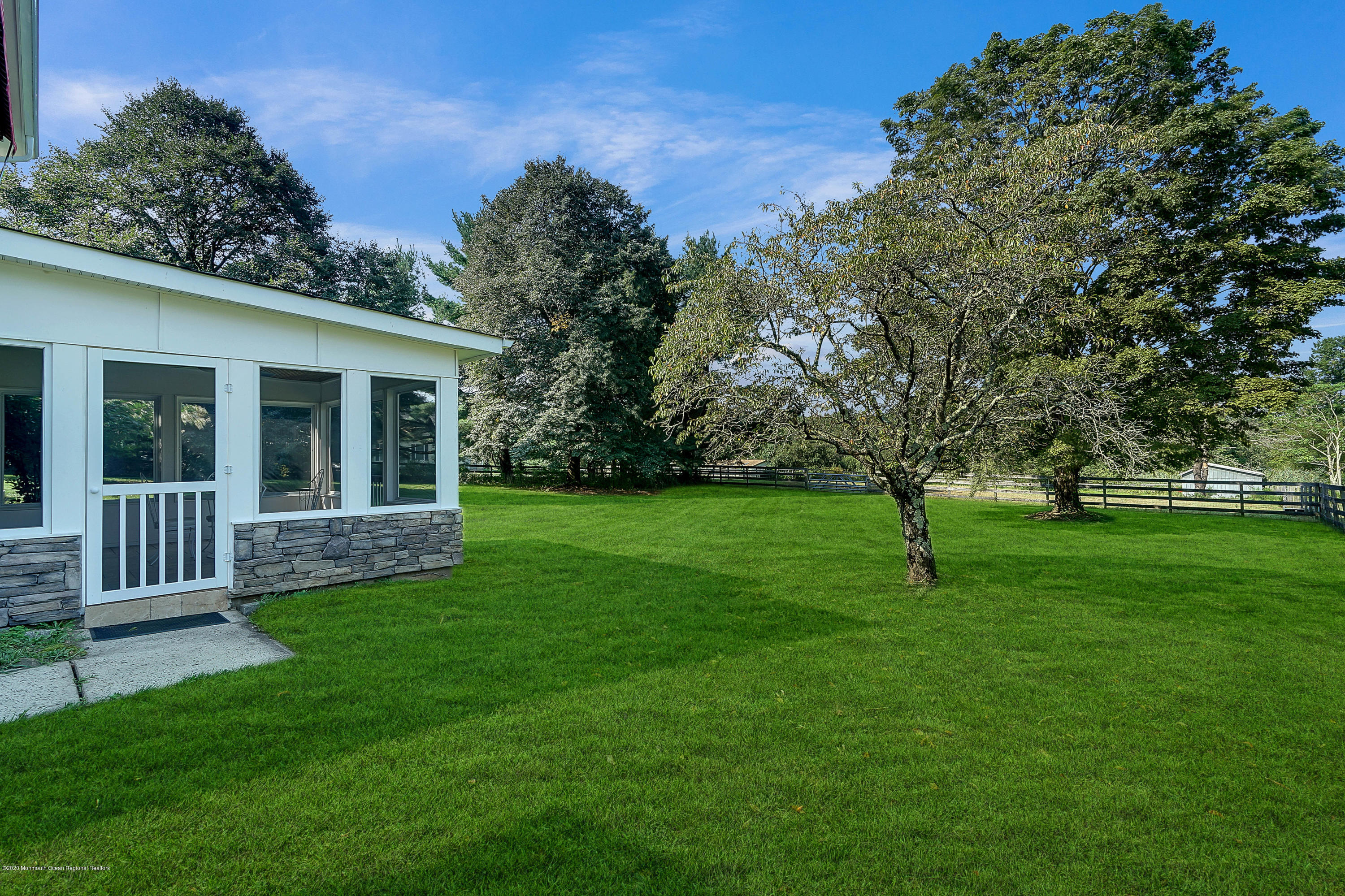 56 Hominy Hill Road Colts Neck, NJ 07722 - Photo 69 of 106 a view of a house with a backyard