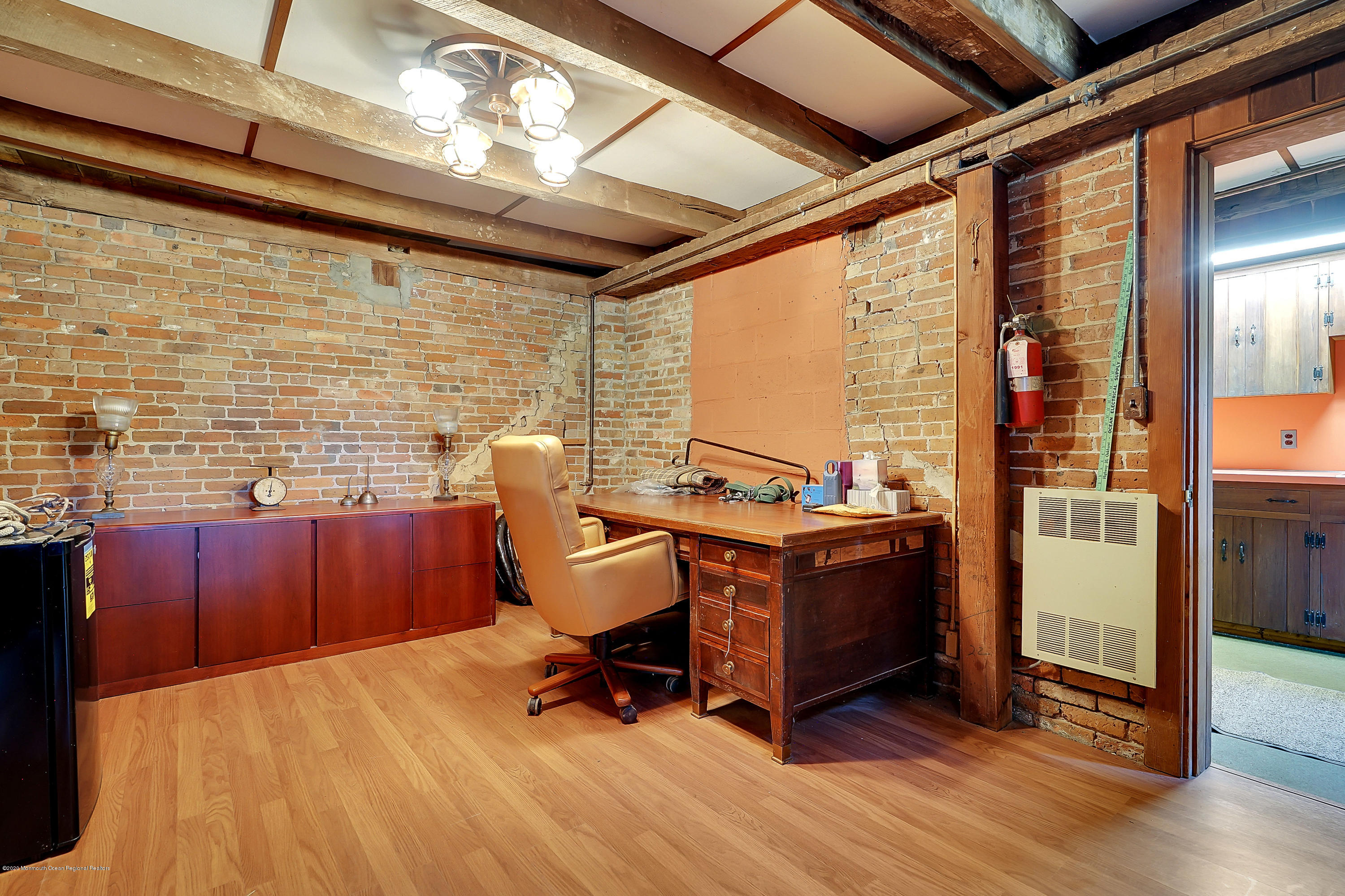 56 Hominy Hill Road Colts Neck, NJ 07722 - Photo 84 of 106 a view of a workspace with furniture and a window