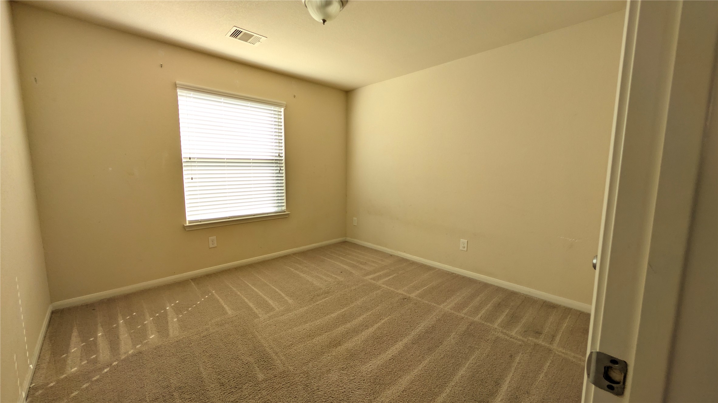 7326 Granite Terrace Lane Houston, TX 77083 - Photo 22 of 39 a view of an empty room with a window