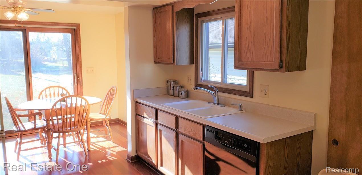 2951 Shewbird Road Wixom, MI 48393 - Photo 11 of 22 Large kitchen flows into the dining room