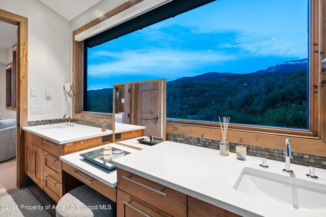 a bathroom with a bathtub and a sink