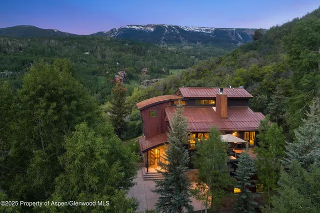 a view of a back yard from a balcony