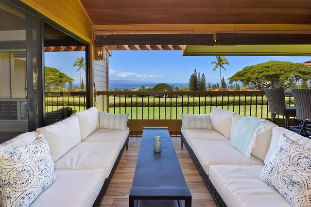 a view of walk in closet with clothes