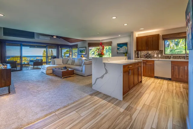 a spacious bathroom with a shower a mirror and a shower