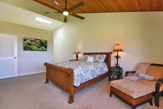 a bedroom with furniture window and book shelf