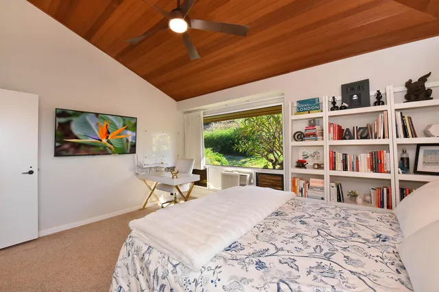 an aerial view of a house with a garden