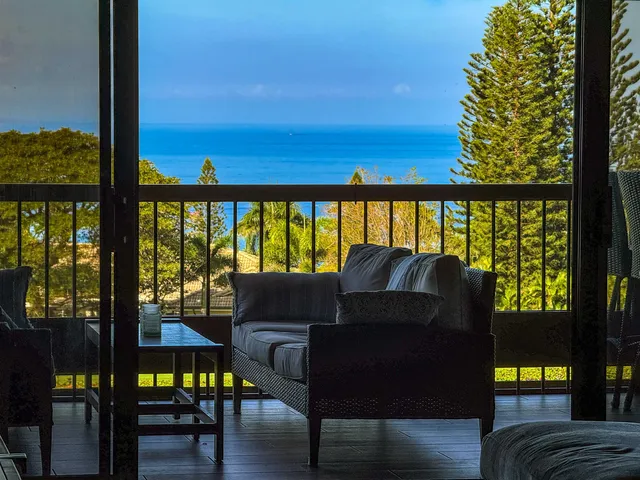 a view of livingroom with furniture and a window