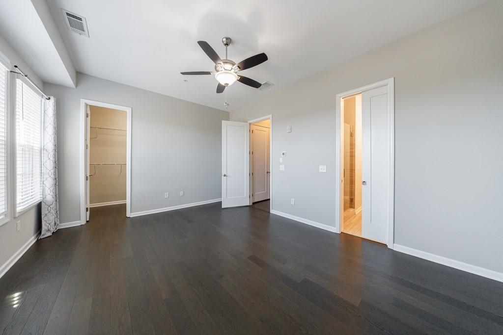 225 Britten Pass Alpharetta, GA 30009 - Photo 25 of 38 a view of an empty room with wooden floor and a window