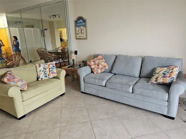 a living room with furniture and a couch