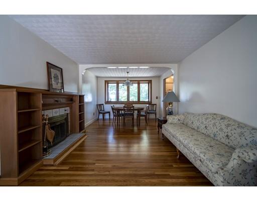 75 Hilldale Road Ashland, MA 01721 - Photo 12 of 37 a living room with furniture and a fireplace