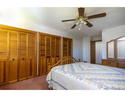 75 Hilldale Road Ashland, MA 01721 - Photo 22 of 37 a bedroom with a bed and a large mirror