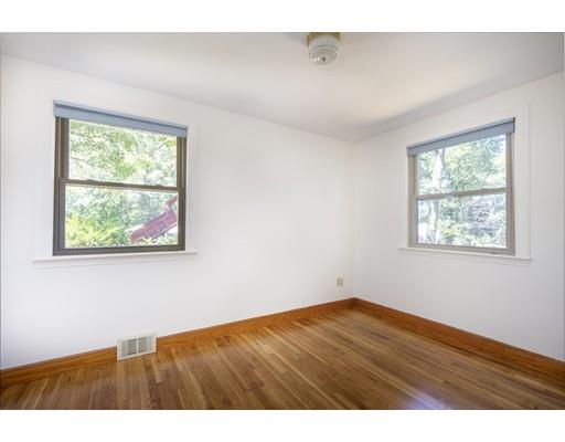 75 Hilldale Road Ashland, MA 01721 - Photo 23 of 37 a view of an empty room with wooden floor and a window