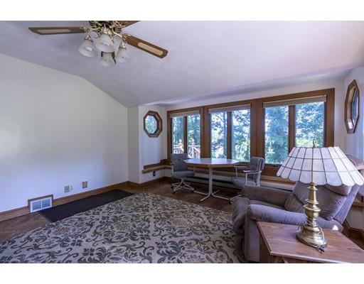 75 Hilldale Road Ashland, MA 01721 - Photo 9 of 37 a living room with furniture and a floor to ceiling window