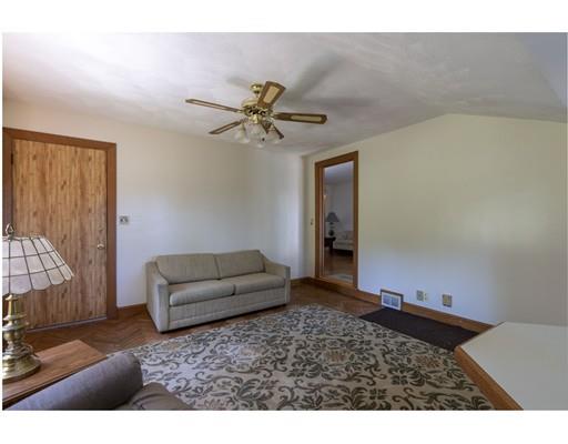 75 Hilldale Road Ashland, MA 01721 - Photo 10 of 37 a living room with furniture and a ceiling fan