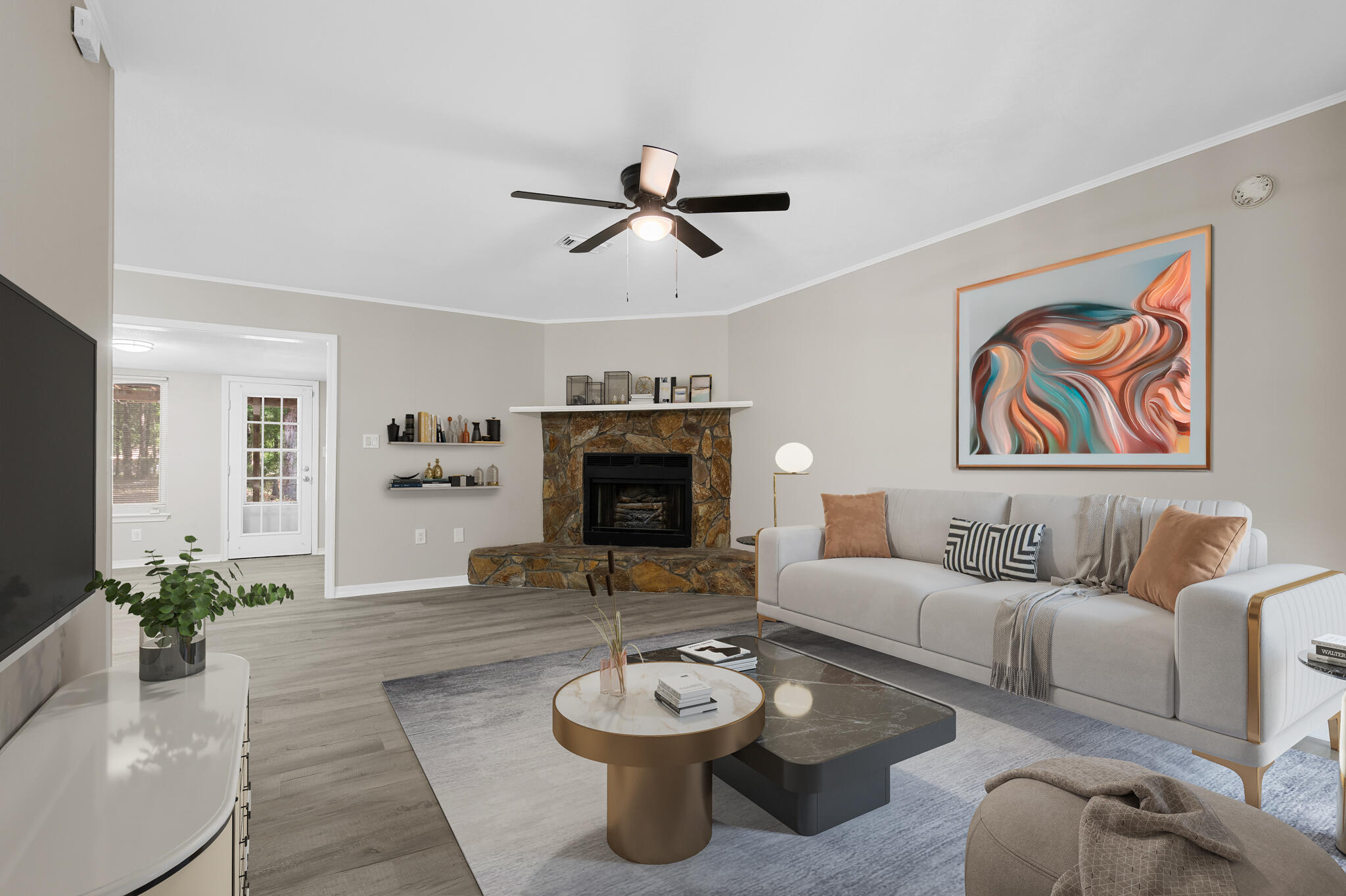 a living room with furniture and a fireplace