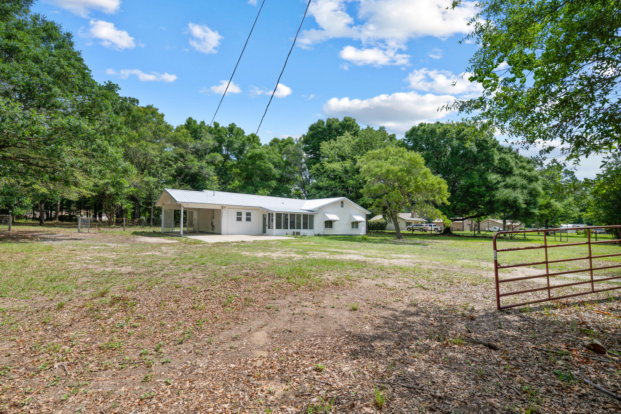 3437 Auburn Road Crestview, FL 32539 - Photo 26 of 26 a view of a house with a yard