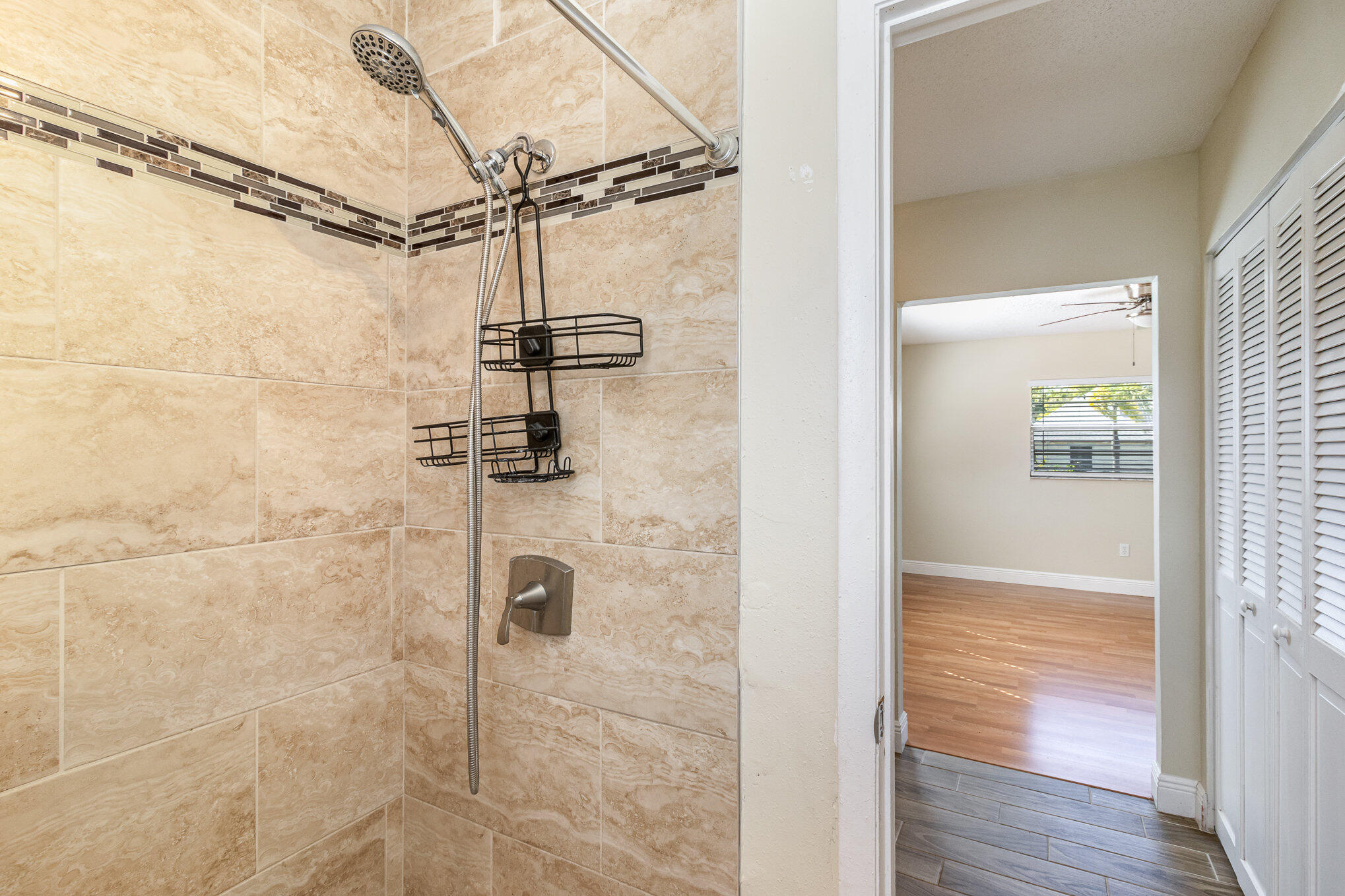 1294 Cimarron Circle Northeast Palm Bay, FL 32905 - Photo 25 of 45 a bathroom with a shower