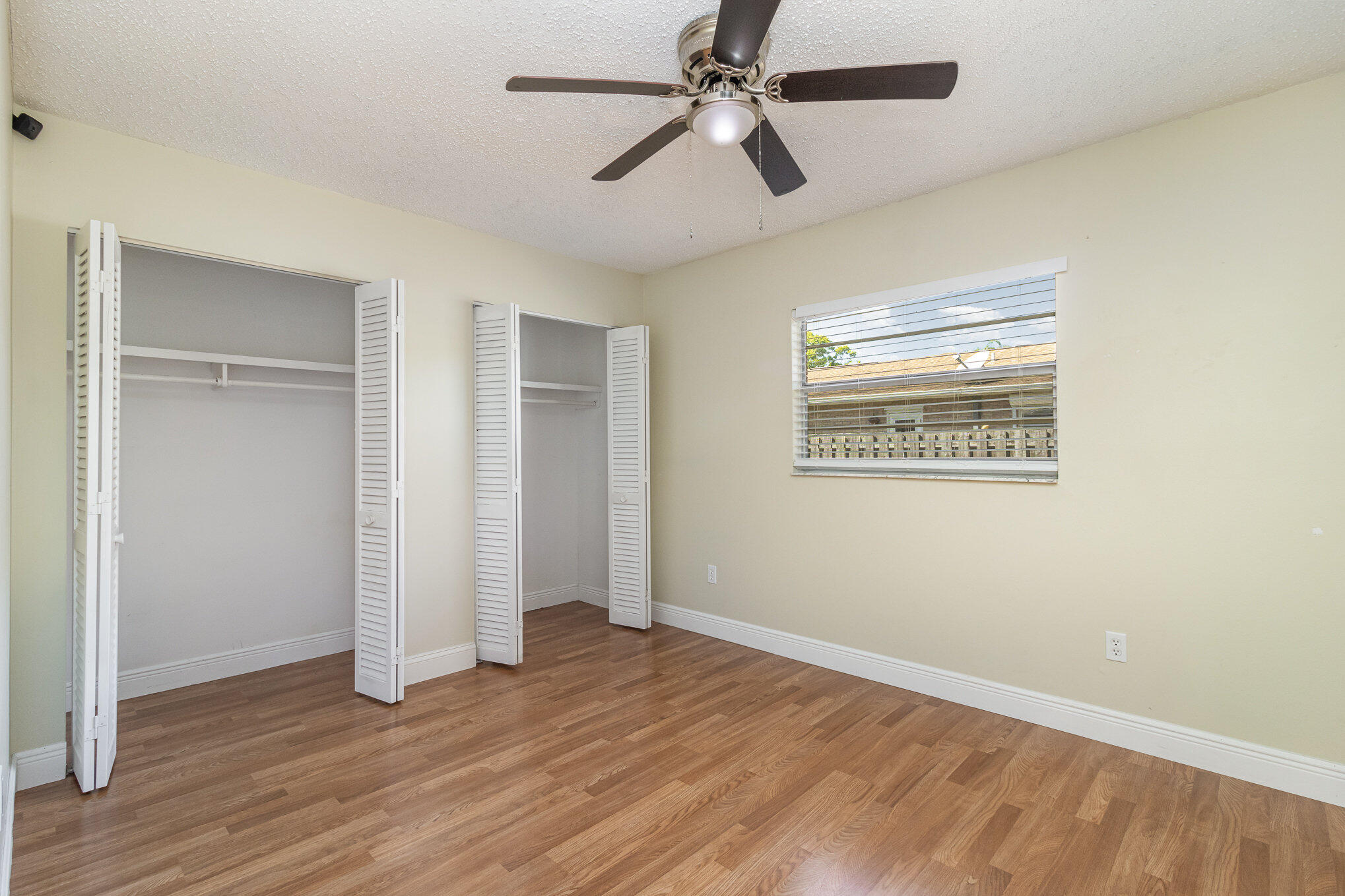 1294 Cimarron Circle Northeast Palm Bay, FL 32905 - Photo 26 of 45 a view of empty room with wooden floor