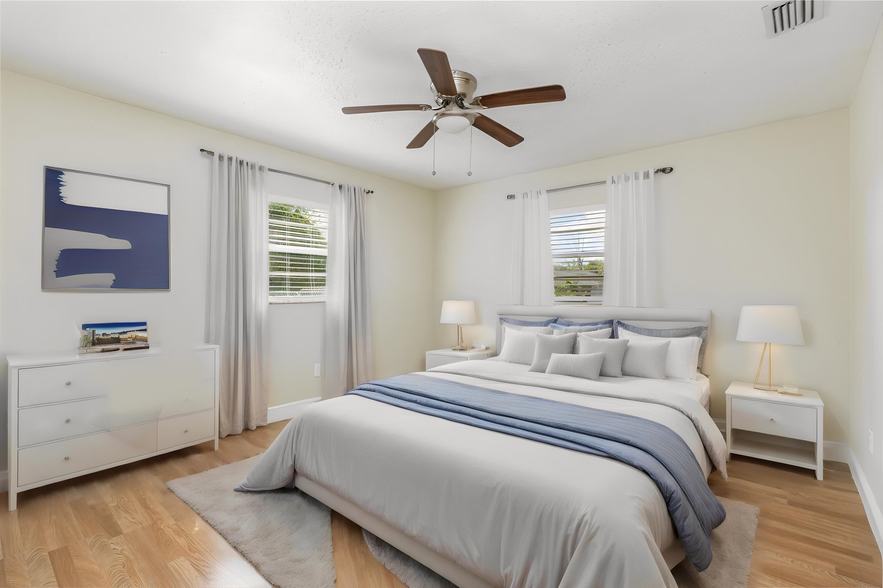 1294 Cimarron Circle Northeast Palm Bay, FL 32905 - Photo 30 of 45 a bedroom with a bed and a window